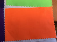 Ripstop Polyester Orange - Erittäin vahva kangas, joka on vahvistettu lasikuitua leijarakentamista varten.
